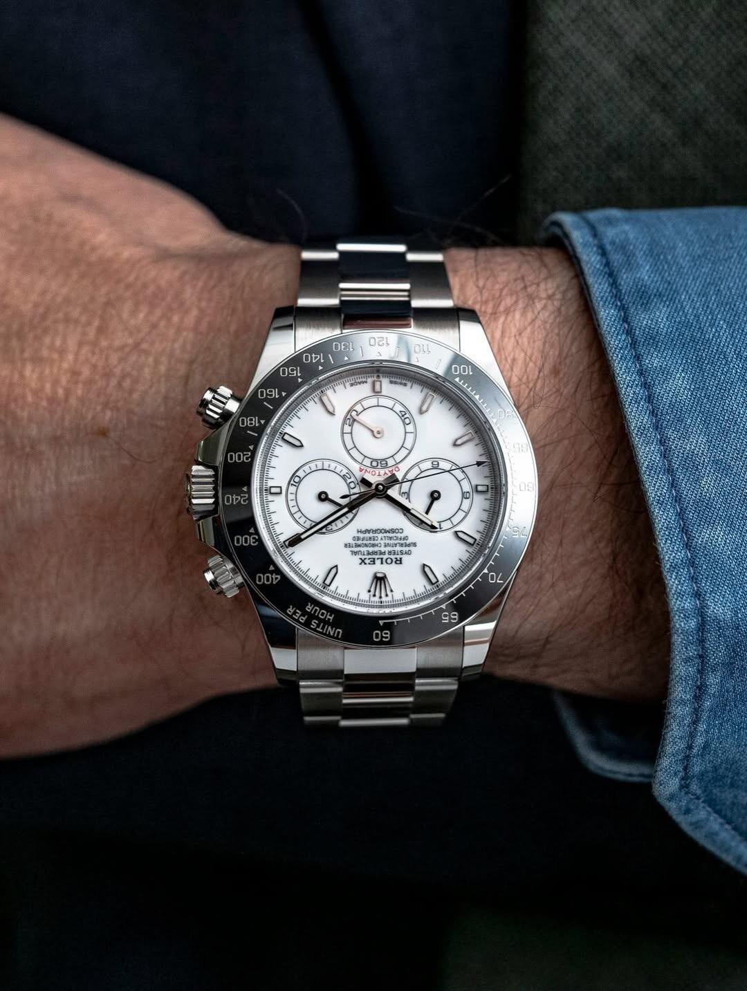 Wrist shot of the VS Factory Rolex Daytona 126502-0001 paired with a denim shirt)