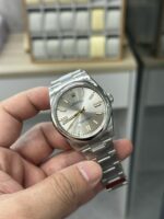 VS Factory Rolex Oyster Perpetual 41mm Silver Sunburst Dial (Gold Accents) Smooth Bezel Oyster Bracelet (124300) 1:1 Super Clone – DD3230 Movement - Image 3