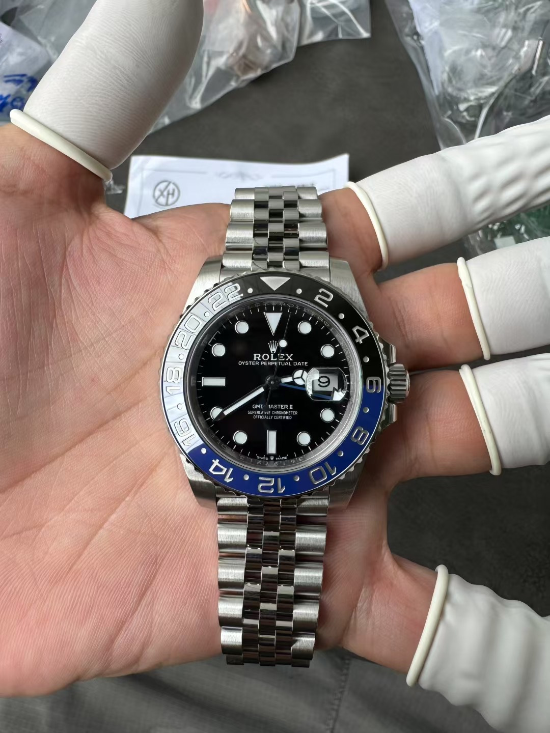 Micro close-up of the VSF GMT-Master II 6 o'clock bezel color transition and inner rehaut engraving