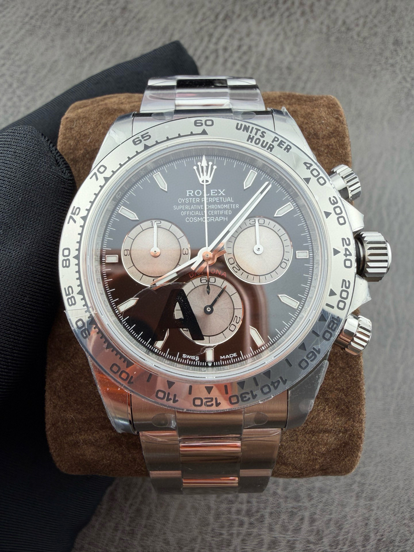Full dial view of the VSF Rolex Daytona 126509 showing the slate gray sunburst dial and balanced sub-dial layout