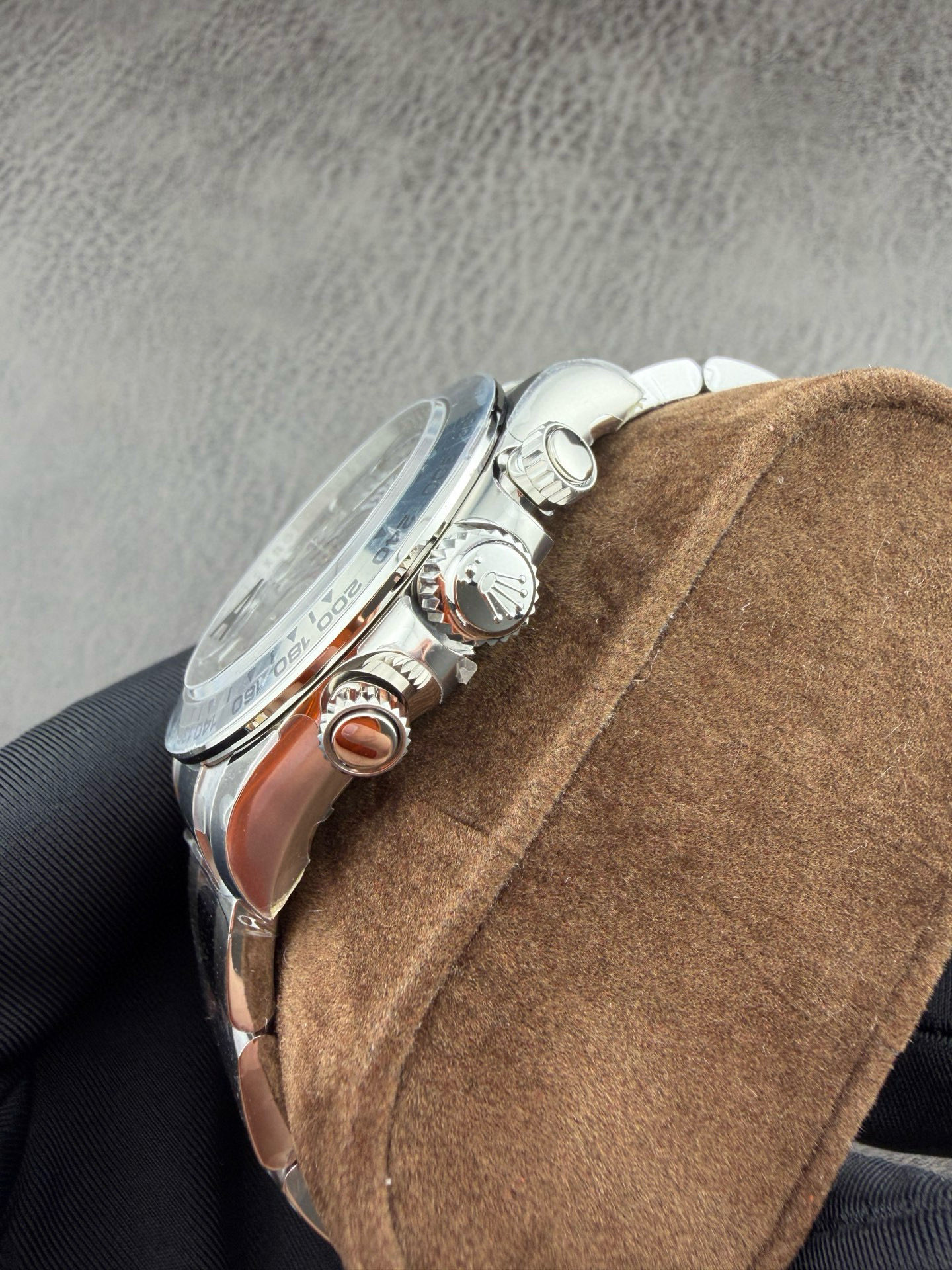 Chronograph profile view of the VSF case showing the flowing lug lines, crown guards, and mirror polishing