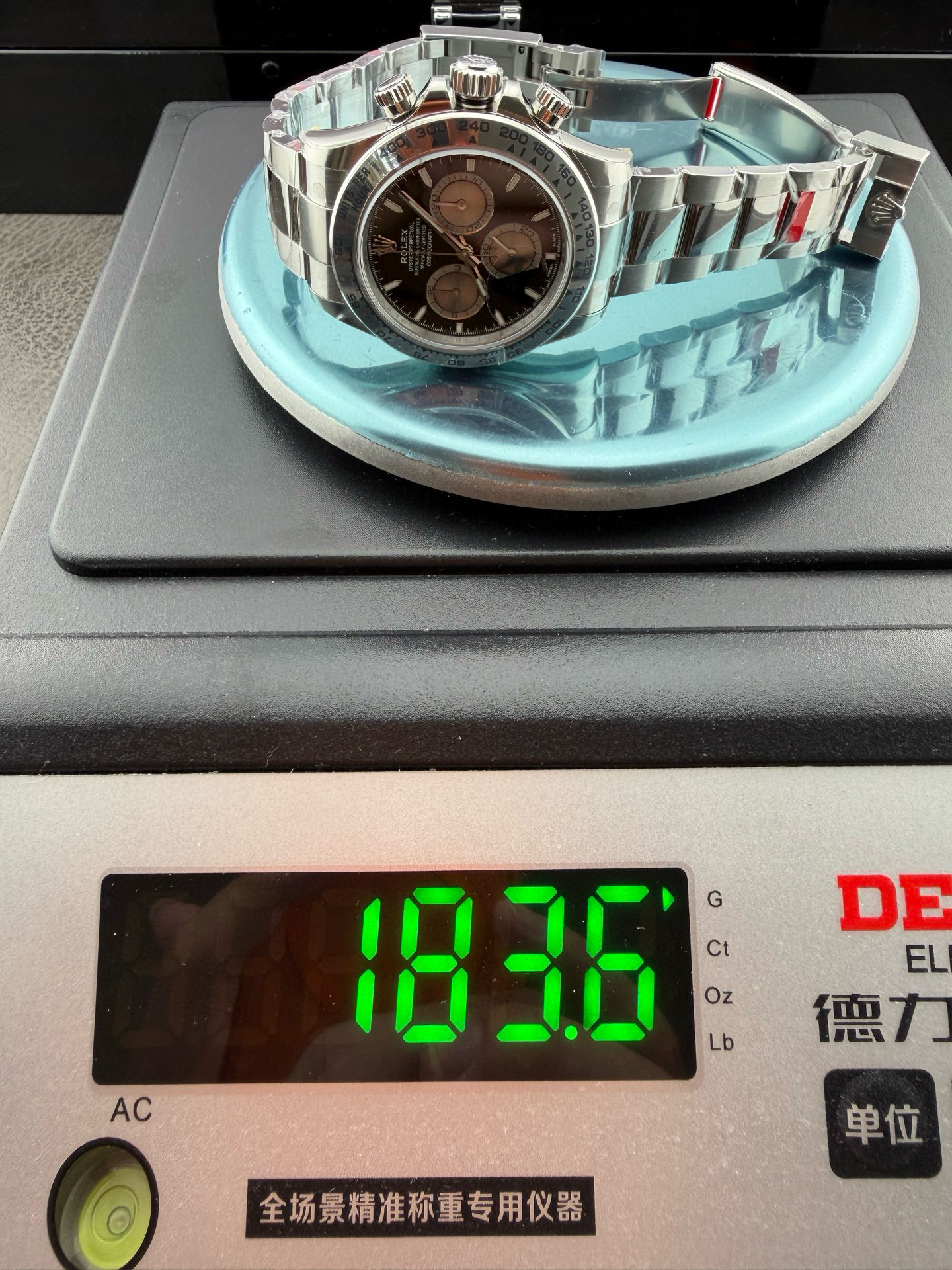 VS Factory Weighted Daytona 126509 on a digital scale registering 183.6 grams