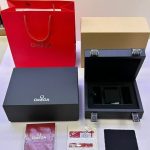 Complete Omega Speedmaster watch box set with red gift bag